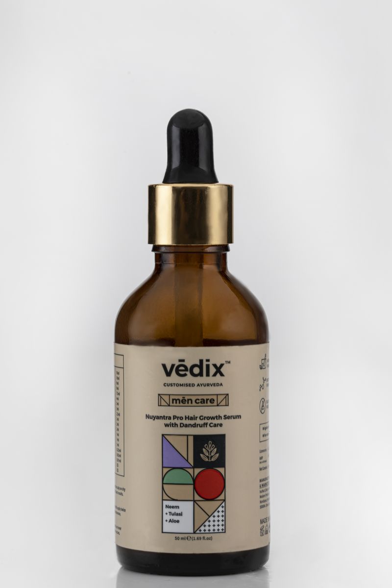 Vedix men care hair growth serum bottle shot on a clean white background by a product photography team in Jaipur